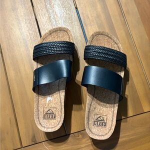 Reef Women’s Black and Tan Sandals